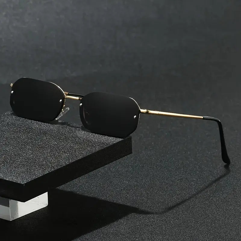 Obsidian Royale – Gold-Trimmed Rimless with Blackout Lenses